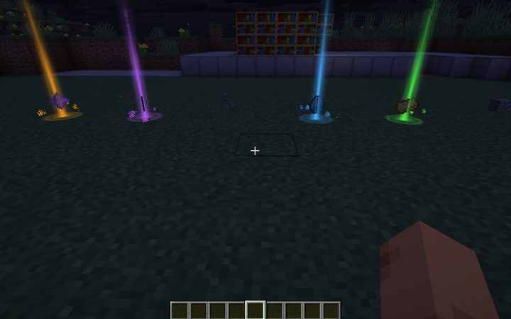 Loot Beams at night: orange, purple, blue and green beams over dropped items